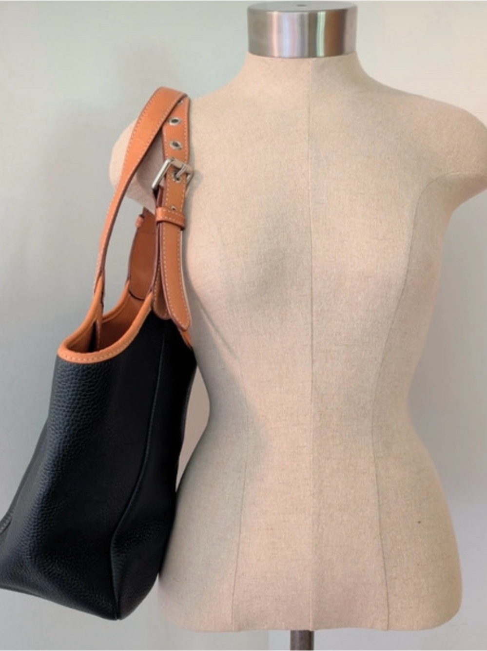 Dooney& Bourke Black & Tan small tote bag with wallet .